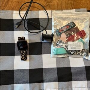 ROSE GOLD FIT BIT VERSA 2 WITH EXTRA BANDS